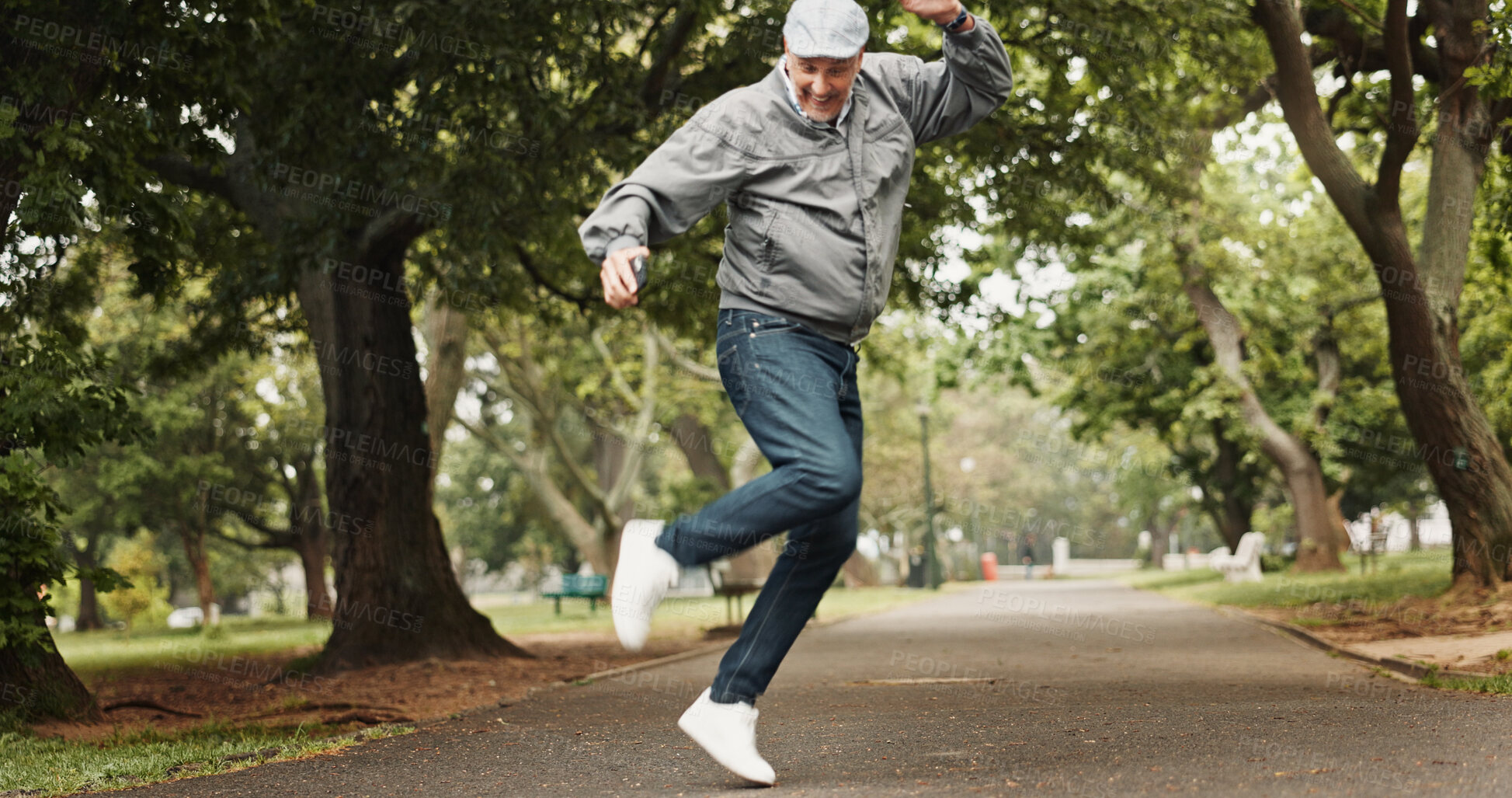 Buy stock photo Senior, excited man or dancing with celebration at park for good news, winning or retirement promotion. Mature, happy or male person with smile in joy for prize, pension increase or freedom in nature