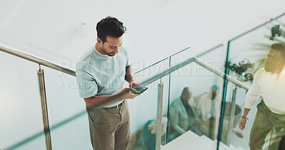 Buy stock photo Smartphone, texting and stairs with business man in office for communication, conversation or project update. Break, discussion and negotiation with employee, steps and above in workplace typing