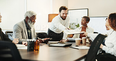 Buy stock photo Documents, handout and workshop with business people in boardroom of office for coaching or training. Collaboration, diversity and meeting with professional employee group in corporate workplace
