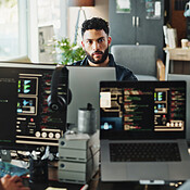 Man, developer and programmer with computer for coding solutions ...
