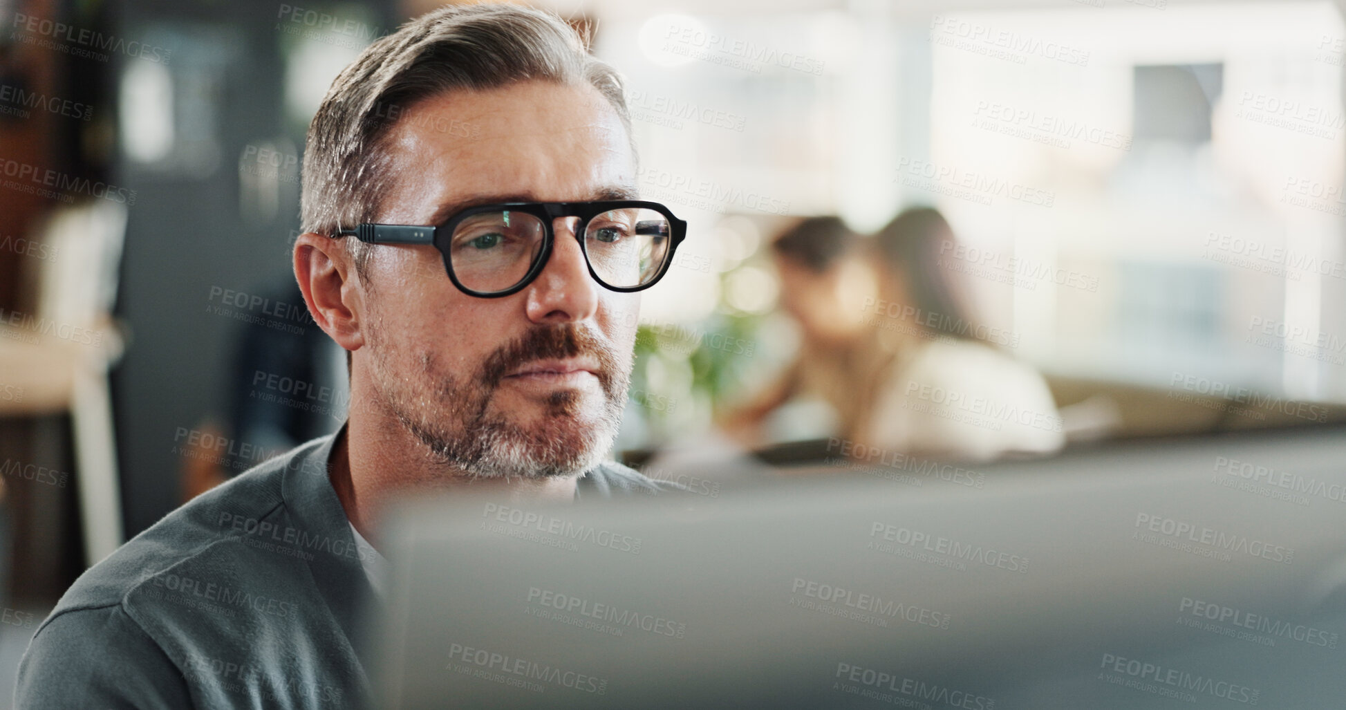 Buy stock photo Glasses, research and computer with business man in office for planning, networking or company newsletter. Website designer, vision and online with mature person in creative startup for proposal