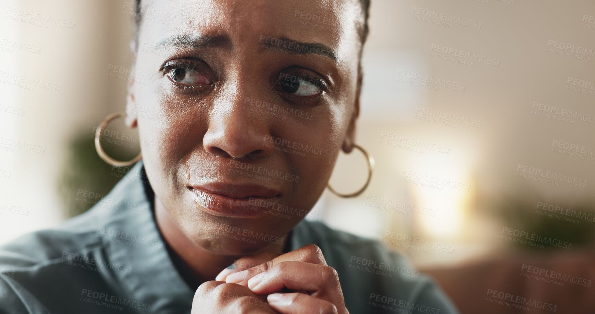 Buy stock photo Crying, sad face and black woman with depression, thinking and psychological trauma in home living room. Tears, unhappy and African person with anxiety for crisis, mental health challenge and stress