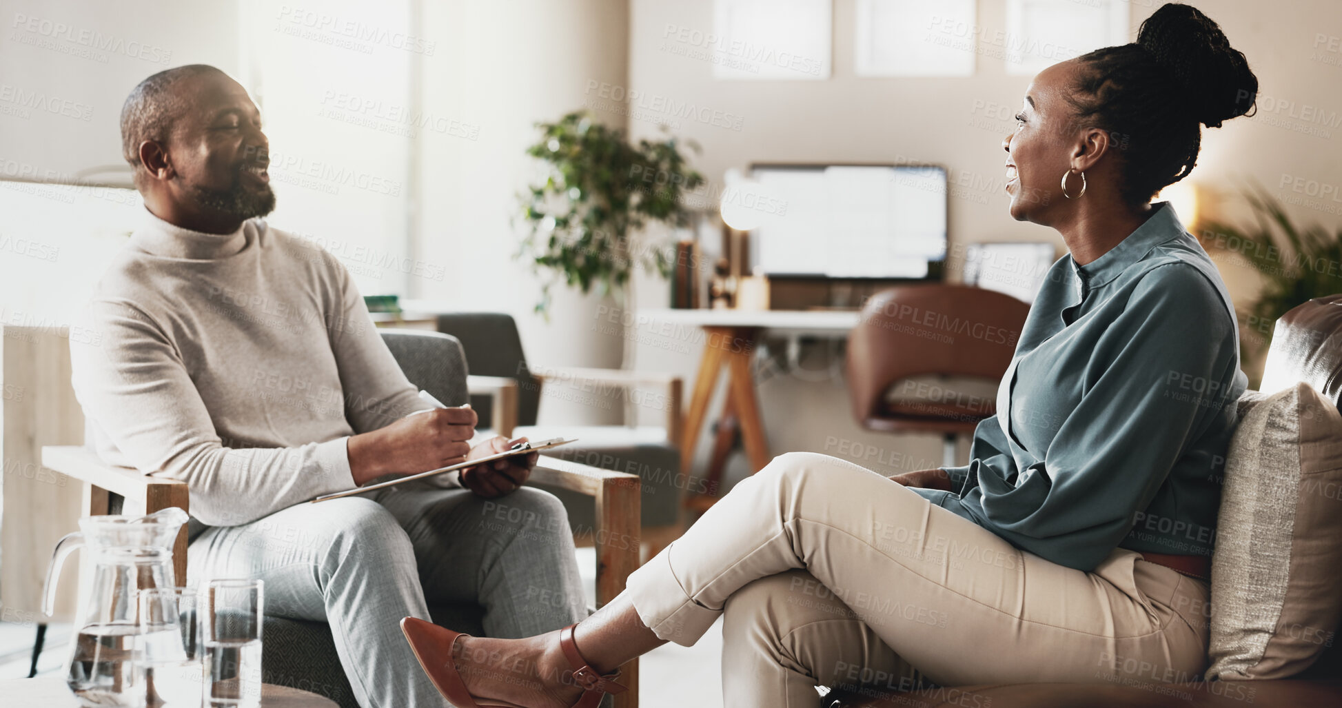 Buy stock photo Black people, therapist or consulting with client for therapy session, discussion or counselling at office. African, man and woman with smile or help for friendly chat, emotion or therapeutic advice