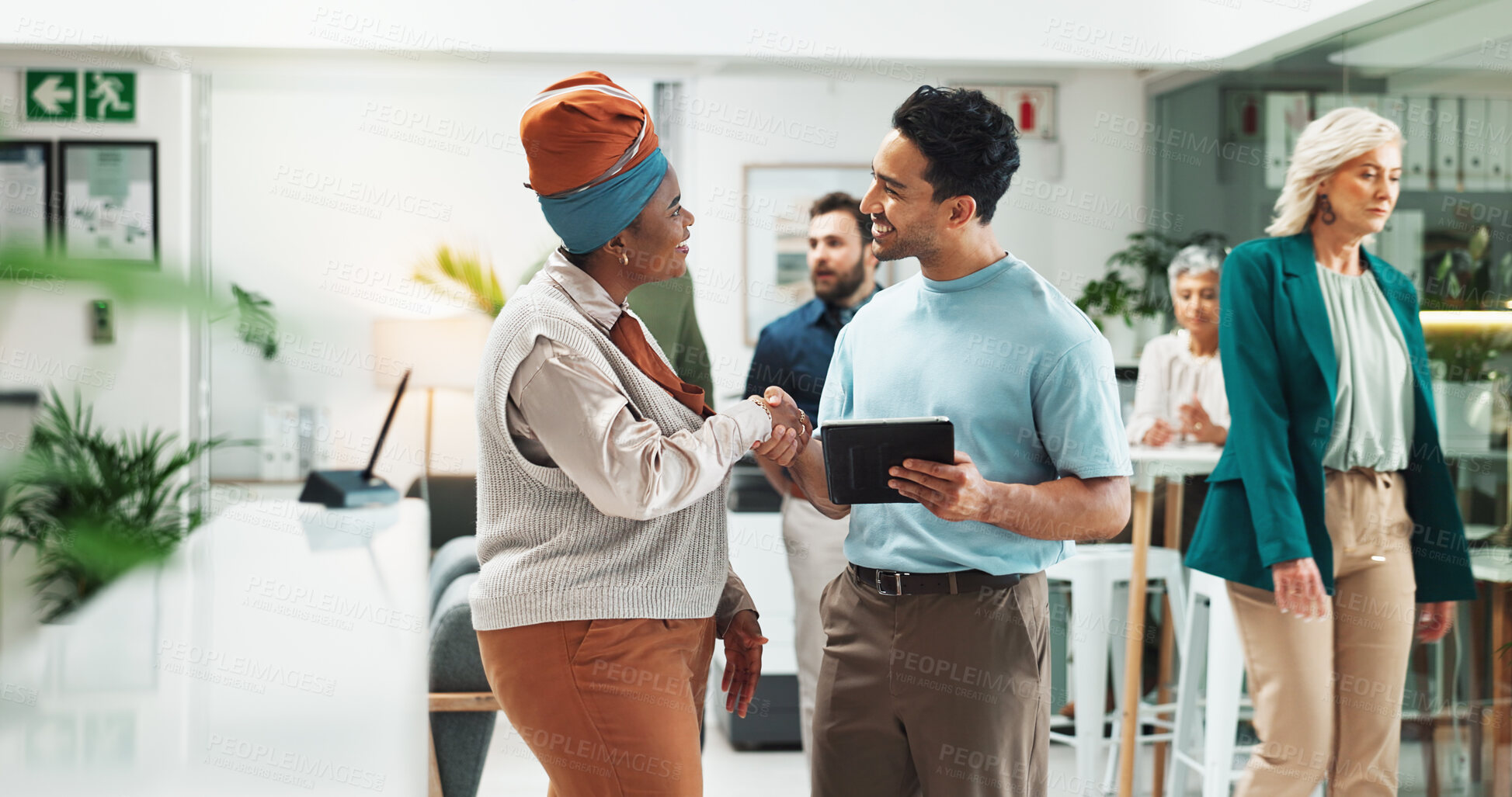 Buy stock photo Tablet, happy team and business people shaking hands for collaboration, thank you or support in creative startup. Technology, partnership and handshake for project funding, sponsorship or agreement