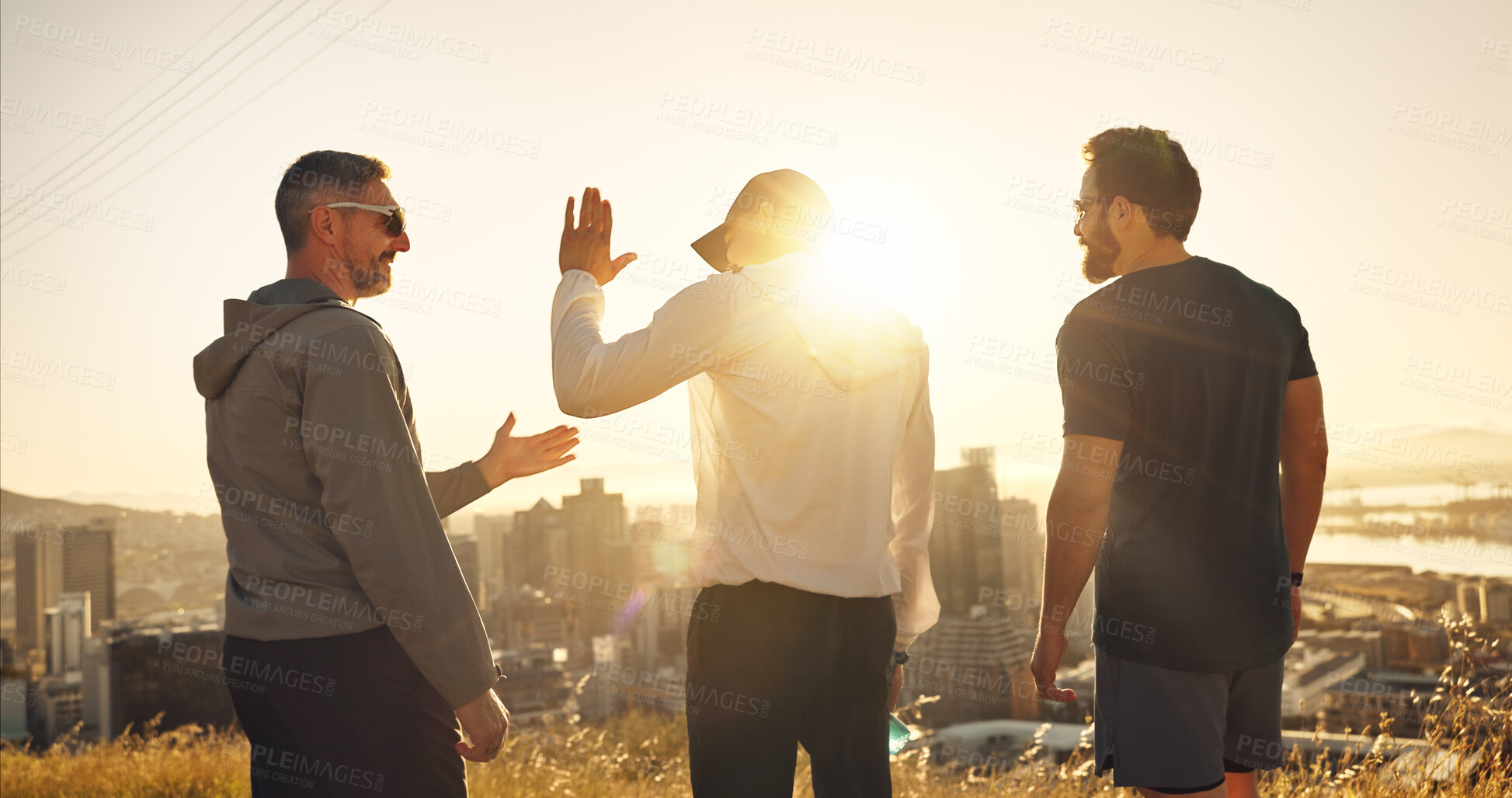 Buy stock photo Fitness, men and mountain with high five for workout, achievement or winning in nature sunset. Back view, male people or friends with success for exercise, celebration or teamwork in outdoor training
