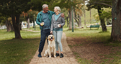 Buy stock photo Hug, old couple and walking dog in park together for outdoor fitness, health or wellness. Exercise, hobby or leisure with senior man and woman embracing in nature for Labrador obedience training