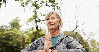 Buy stock photo Mature, woman and yoga with namaste in nature for meditation, spiritual wellness or zen at park. Senior, female person or yogi with hands together for awareness, inner peace or healing in forest