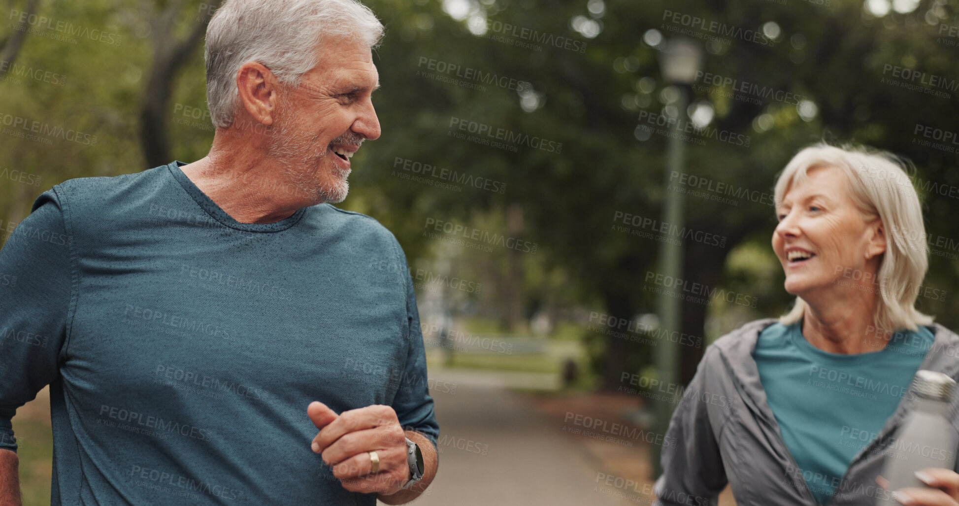 Buy stock photo Outdoor, park run and mature couple with talk, smile and calm from exercise and fitness with bottle. Nature, happy and people with drink, training and workout for health in the morning on weekend