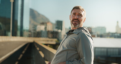 Buy stock photo Mature man, fitness and tired on bridge with break for race, running challenge and marathon training. Breathing, exhausted and male athlete with cardio exercise or workout on city road with fatigue