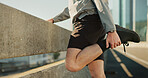 Man, city and stretching legs for training, warm up and road for cardio preparation. Male person, urban street and athlete feet for sports workout, getting ready and closeup of exercise activity