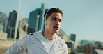 Man, runner and earphones for fitness in city with outdoor training, challenge and prepare for marathon. Person, athlete and listen to music, audio or streaming in street for exercise in Costa Rica
