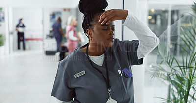 Buy stock photo Nurse, headache and woman with stress, burnout and fatigue with mental health challenge in hospital. Surgeon, migraine or tired medical professional with pain, exhausted and sick of anxiety in clinic