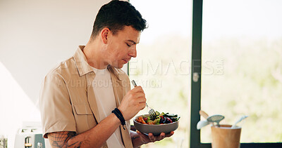 Buy stock photo Nutrition, eating and man with breakfast in kitchen in morning for organic bowl. Vegan, health and male person enjoying fruit salad for snack, lunch or craving on diet, vitamins or wellness in home.