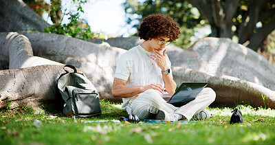 Buy stock photo Man, student and laptop for studying at park, lawn and reading with project for online course. Person, computer and e learning on grass for scholarship, exam and education with thinking in Costa Rica