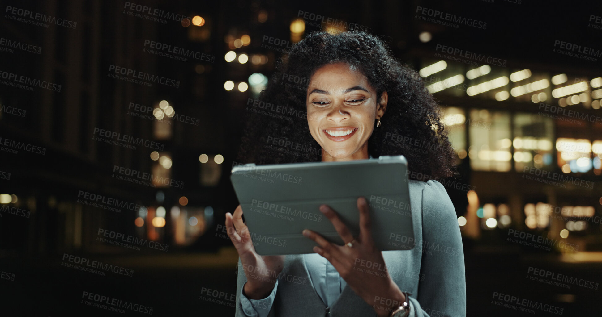 Buy stock photo Business woman, tablet and happy in city, reading and contact with application on commute in street. Person, smile and digital touchscreen for notification, night or chat on urban sidewalk in Brazil