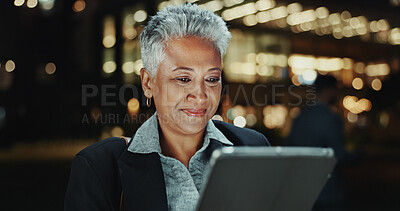 Buy stock photo Mature business woman, tablet and city at night, reading or contact on app with smile in street. Person, happy and digital touchscreen for notification, deal and email on urban sidewalk in Costa Rica