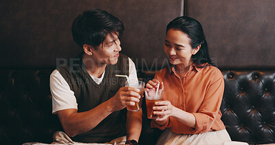 Buy stock photo Japanese, couple and drinks in restaurant for cheers, anniversary celebration or love in relationship. Valentines day, man or woman with glasses for beverage, connection or bonding with toast on date