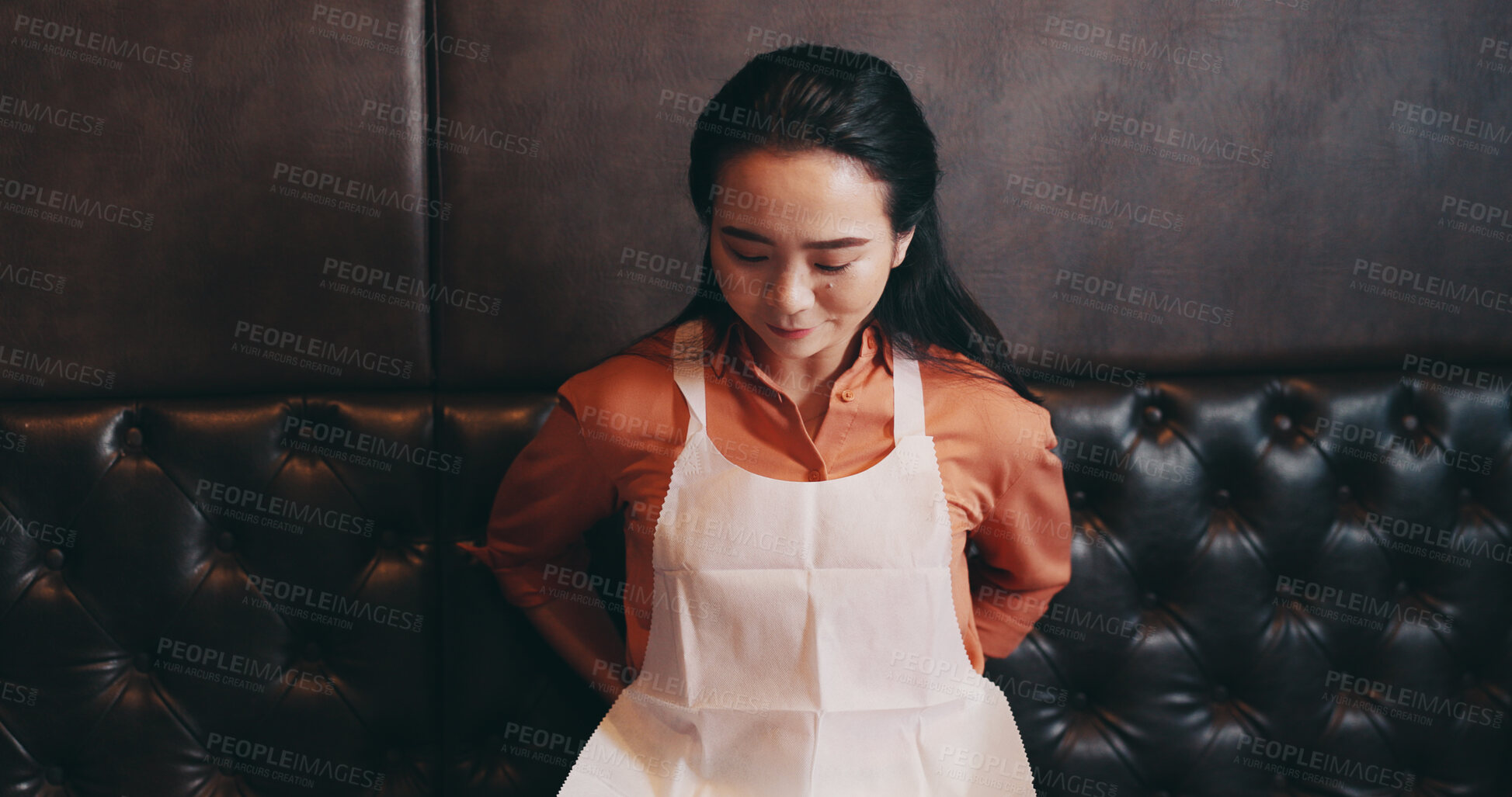 Buy stock photo Japanese woman, waitress and apron at restaurant, job and getting ready for catering, ppe and thinking. Person, server and staff on break, career or prepare for cooking, reflection or gear at diner