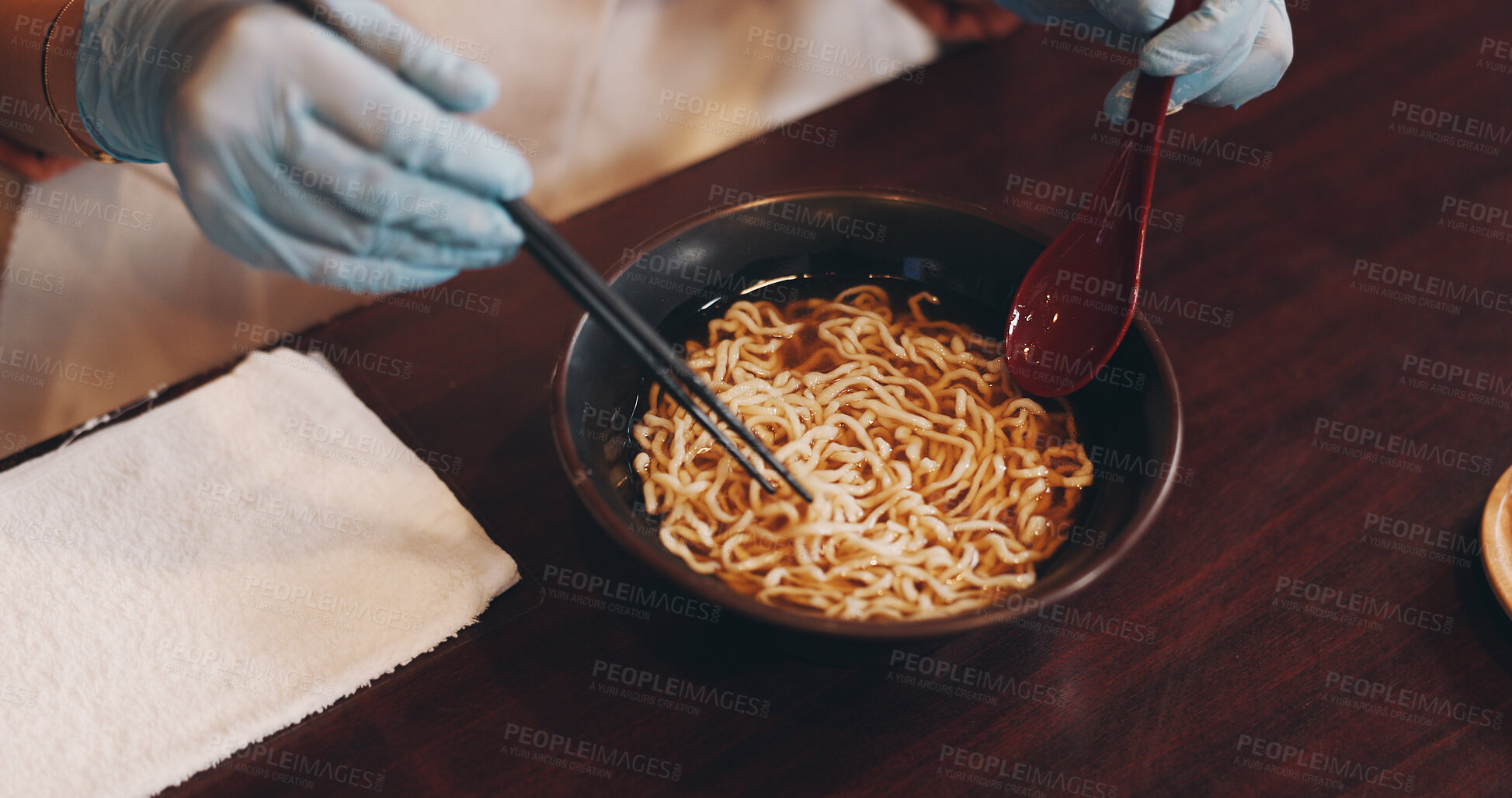 Buy stock photo Asian restaurant, ramen and hands of chef with noodles for dinner, lunch and supper. Culinary, traditional cuisine and person with chopsticks for healthy eating, nutrition and gourmet dish in Japan