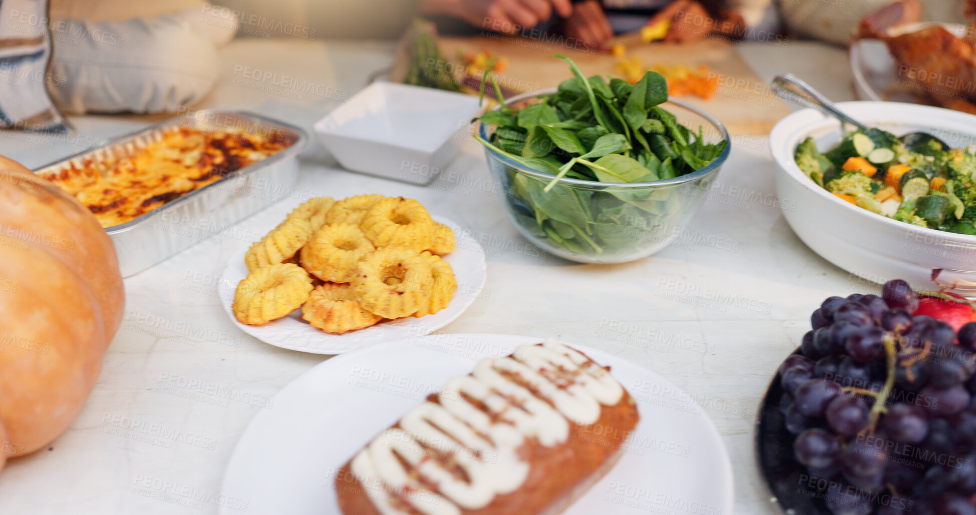 Buy stock photo Dinner, nutrition and food with celebration for thanksgiving, meal and holiday for gratitude at home. Closeup, people and dish for supper with fruits, vegetables or dessert for festive feast in house