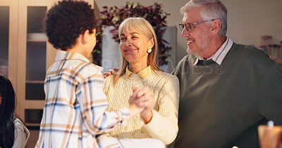 Buy stock photo Dancing, happy and grandparents with child in home for holiday, vacation and festive season. Thanksgiving, Christmas and house with grandpa, grandma and kids for celebration, bonding and tradition