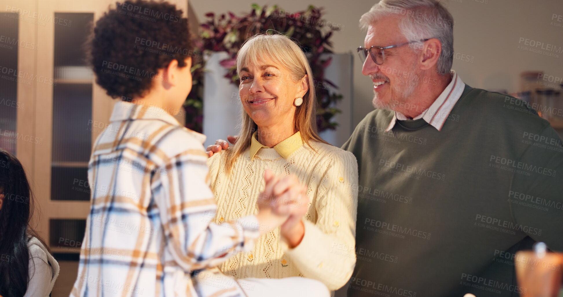 Buy stock photo Dancing, happy and grandparents with child in home for holiday, vacation and festive season. Thanksgiving, Christmas and house with grandpa, grandma and kids for celebration, bonding and tradition