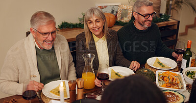 Buy stock photo Big family, dining table and thanksgiving dinner with grandparents, holiday and food in home. Feast, people and festive celebration for party, reunion and gathering with bonding or event on vacation