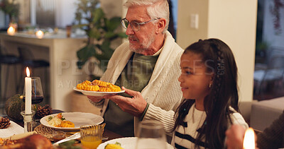 Buy stock photo Home, grandfather and kid with food for thanksgiving, festive feast and holiday celebration as family. House, dish and man with girl with serving for nutrition, bread and bonding with dinner meal