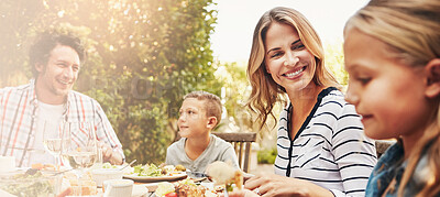 Buy stock photo Smile, parents and children at outdoor lunch with fun, celebration or family eating together in backyard. Mother, father and kids at table for garden picnic with food, laughing or bonding on banner