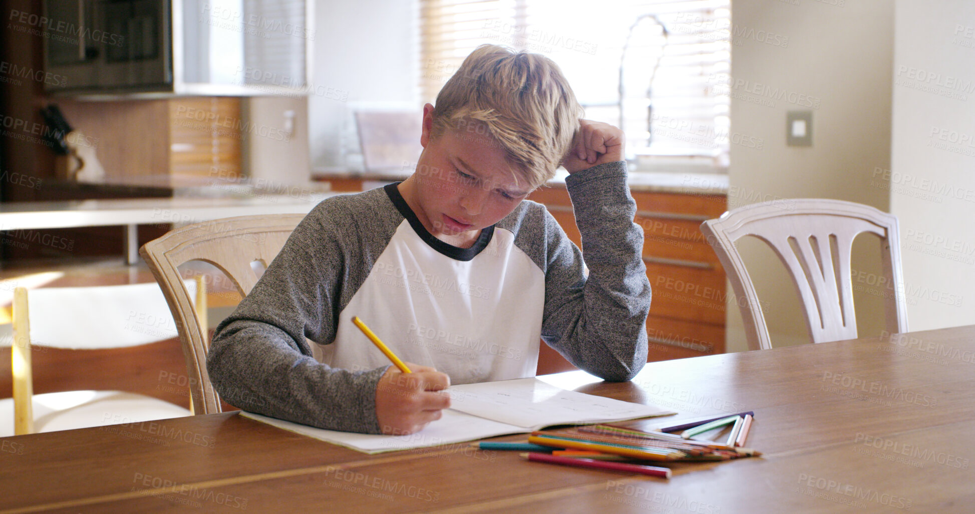 Buy stock photo Boy child, writing and confused with homework, thinking or brain fog for solution, learning or study. Kid, paper and problem solving for education, anxiety or adhd with school project in family house