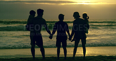 Buy stock photo Back, family and holiday to relax, beach and waves in morning, bonding and children with parents and love. Silhouette, sunrise and people with kids, holding hands and care in nature and California