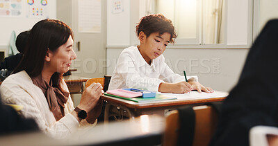 Buy stock photo Education, woman and students in classroom, help and writing with advice, teaching and learning. People, children and female teacher with knowledge, ideas and literature with development and Japan