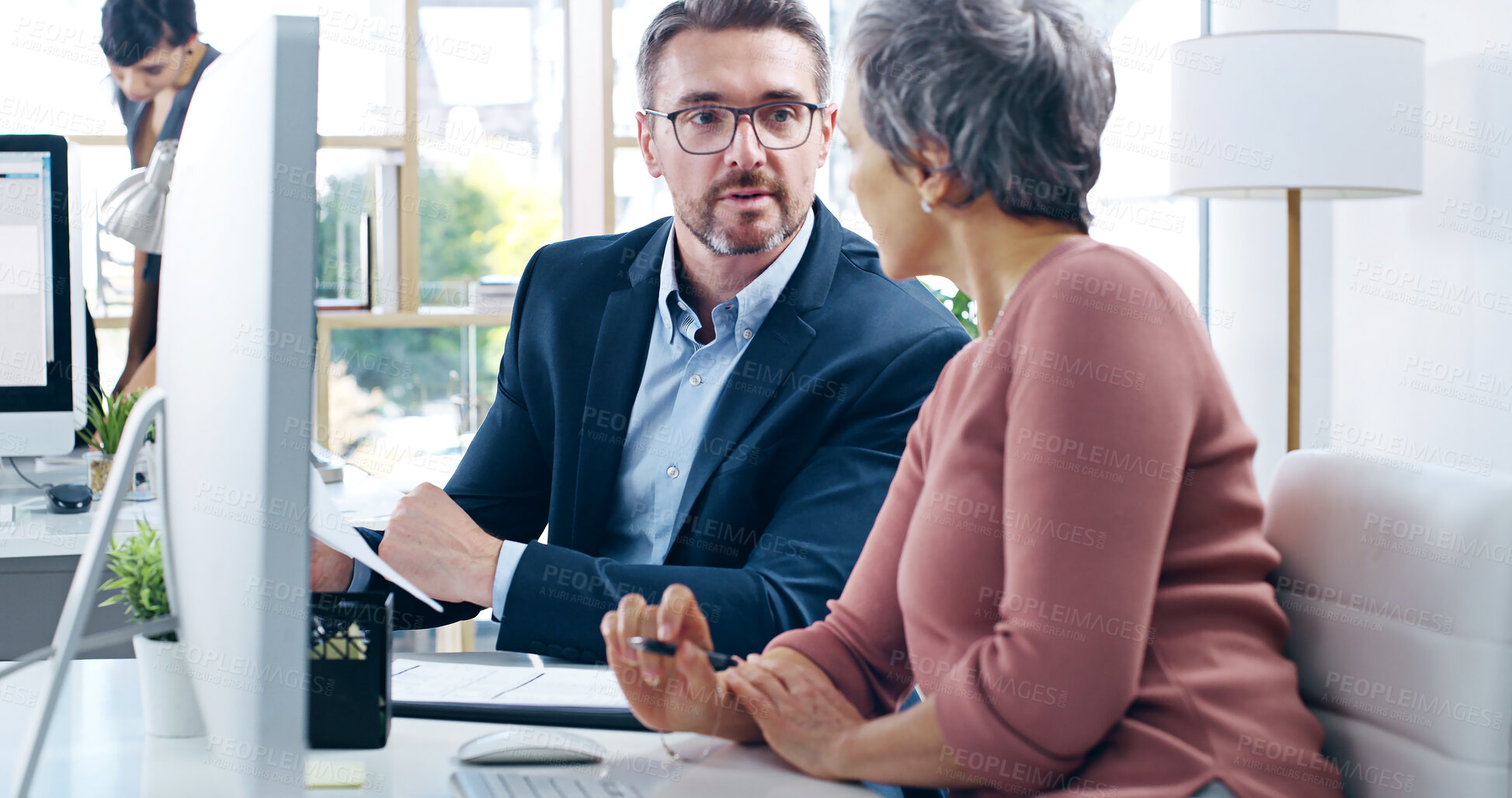 Buy stock photo Collaboration, computer and documents with business people in office together for management or teamwork. Advice, consulting and conversation with corporate man and woman in workplace for development