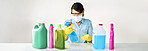 Detergent bottles, inspection and woman with mask, safety or glasses for protection, chore and cleaning. Housekeeping, cleaner or female person with products, liquid container and spray for dust