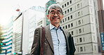 Japanese businessman, outdoor and below in portrait for pride for attorney, law firm and company. Mature, male person and confidence as legal professional with morning commute, career and city street