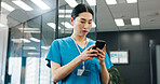 Woman, nurse and phone in hospital for news, schedule update and connectivity. Japanese surgeon, reading or mobile in clinic for patient feedback, telehealth services or healthcare email with results