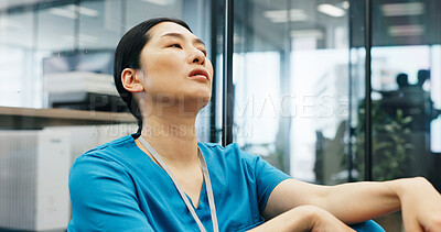 Buy stock photo Japanese, woman and nurse with thinking in hospital of healthcare stress, medical mistake and burnout risk. Surgeon, depression and anxiety of surgery crisis, bad news and treatment disaster in Japan