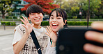 Couple, selfie or excited in park for social media, healthy relationship or memories with love in Osaka. Japanese people, influencers or happy in city for photography, content creation or live stream