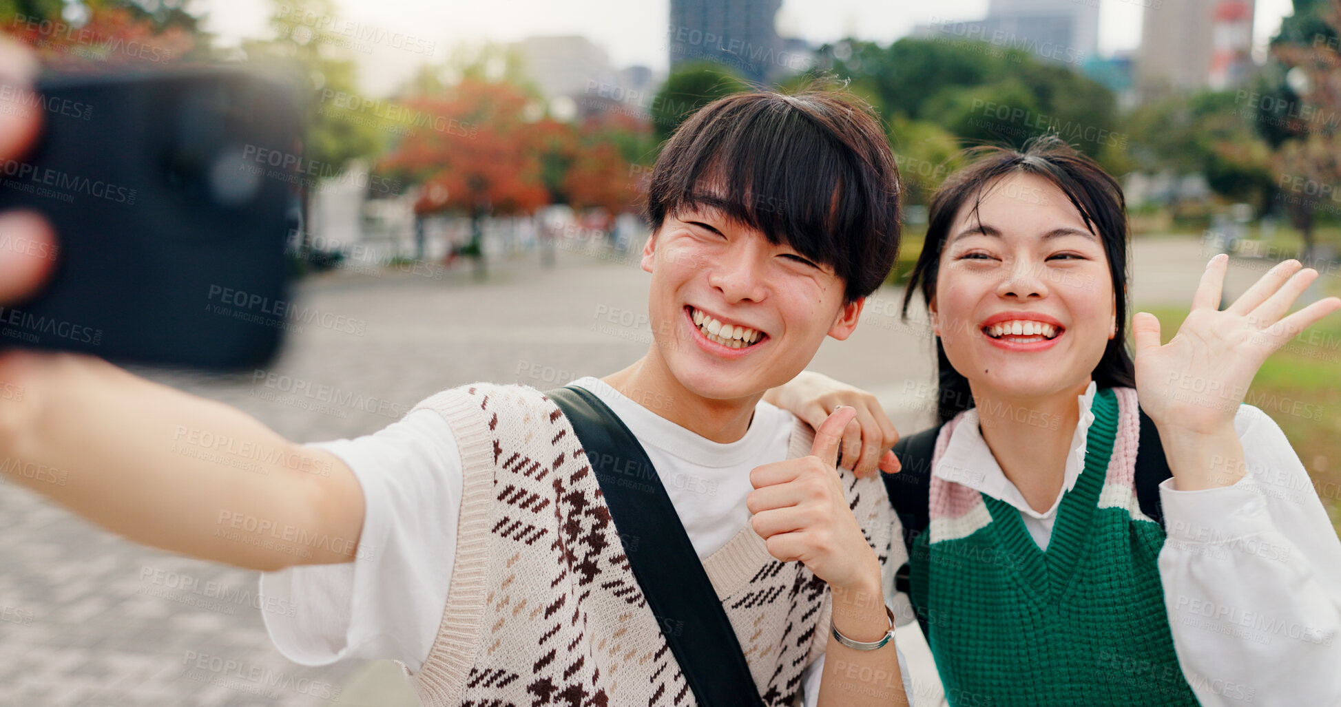 Buy stock photo Happy man, thumbs up or woman in city for selfie, live streaming or excited for travel in Tokyo. Japanese couple, influencers or like emoji in park for photography, vote or social media interaction