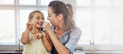 Buy stock photo Child, playing or baking with mom, joke and flour for bonding or learning to prepare dessert in home. Parent, nose or mother teaching girl kid cooking skills for development, cake or lunch recipe