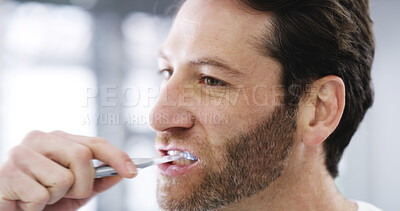 Buy stock photo Dental hygiene, bathroom and man brushing teeth for health, wellness and morning routine. Oral care, toothpaste and male person with treatment for gum disease, cavity or plaque prevention in home