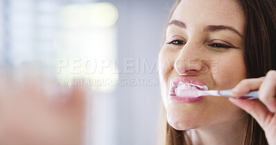 Buy stock photo Oral hygiene, bathroom and woman brushing teeth for health, wellness and morning routine. Dental care, toothpaste and female person with treatment for gum disease, cavity or plaque prevention in home