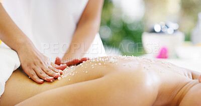 Buy stock photo Hands, people and massage with salt at spa for skincare exfoliation, natural detox and dermatology wellness. Client, masseuse and product for scrub of beauty treatment, rejuvenating and luxury resort