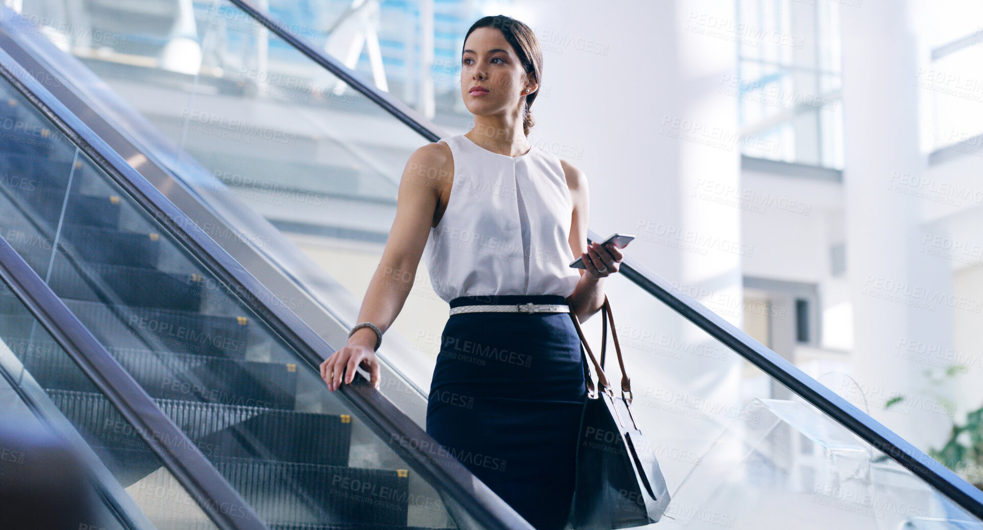 Buy stock photo Business woman, phone and travel on escalator at airport for flight, international journey or think of idea. Professional trip, worker and lobby for arrival, planning and airline broker with vision