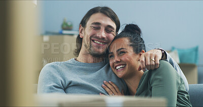 Buy stock photo Happy couple, hug and boxes in new home with love, support and pride for investment opportunity. Man, woman and relax on sofa for moving in, relationship milestone and loan approval for apartment