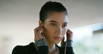 Athlete, woman and earphones for fitness in city of listening to music, training pride and podcast. Girl, headphones and streaming for sport exercise, workout playlist and marathon practice of health