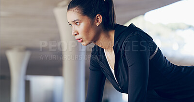 Buy stock photo Woman, fitness and push ups with determination for exercise, training or muscle gain in city. Active, serious or female person lifting bodyweight for strength, health and wellness in an urban town