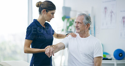 Buy stock photo Physiotherapy, woman and senior man with shoulder pain for stretching, help and care in office. Chiropractor, elderly patient or advice in practice for rehabilitation, healing or arm exercise in exam