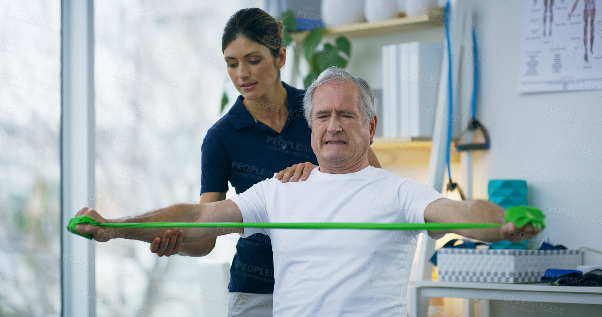 Buy stock photo Resistance band, senior man and physiotherapist with consultation, wellness or recovery. Employee, physical therapy or client with healthcare, support or healing with strength training or stretching