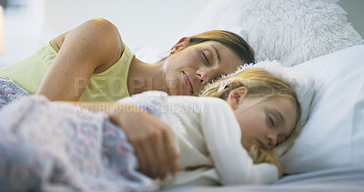 Buy stock photo Mama, daughter and sleeping together in bedroom, peace and support in dream of family home. Mommy, girl and late weekend morning with child for nap, comfort and embrace security in relationship